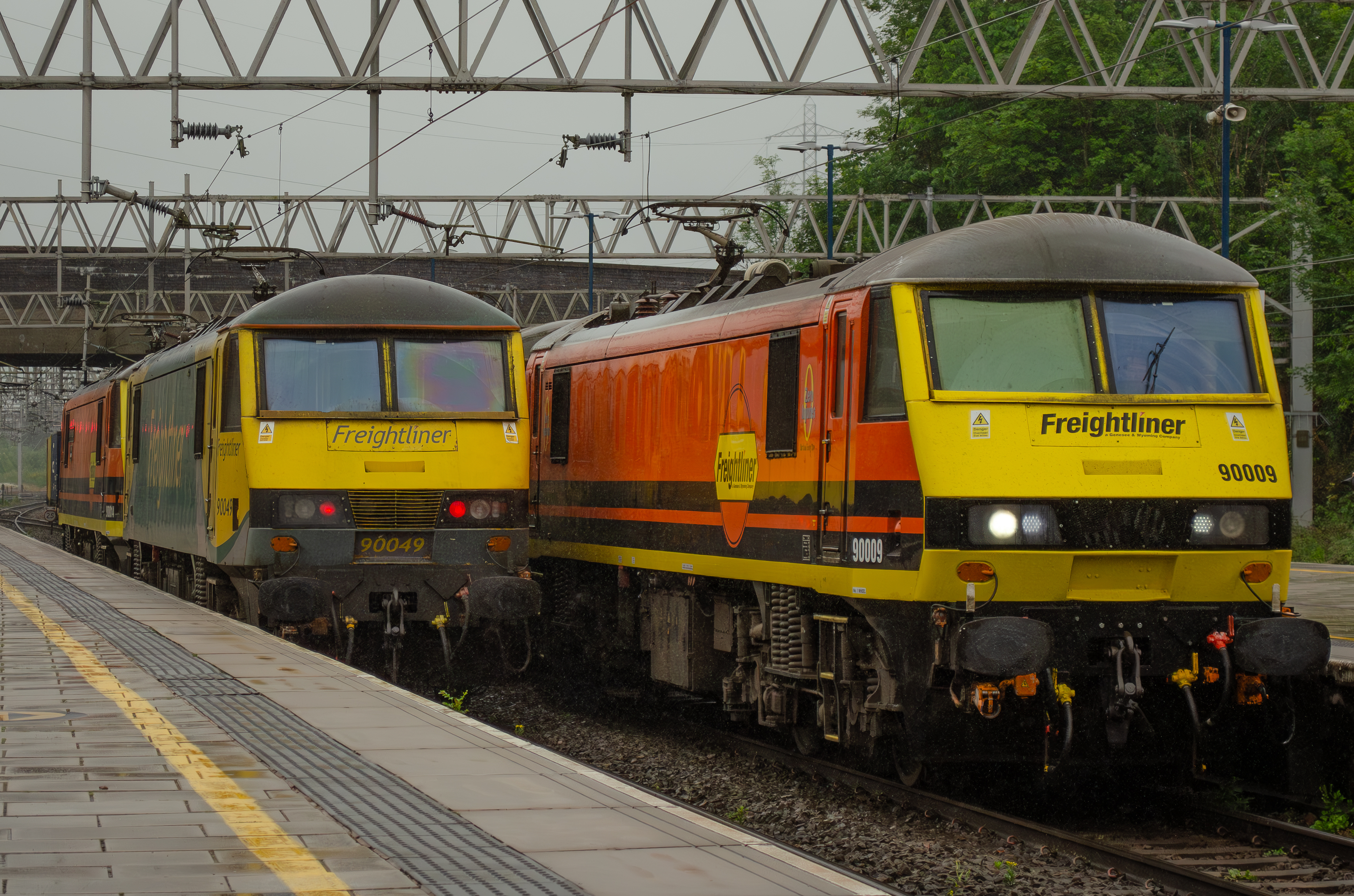 4 Freightliner Class 90s pass each other at Stafford.