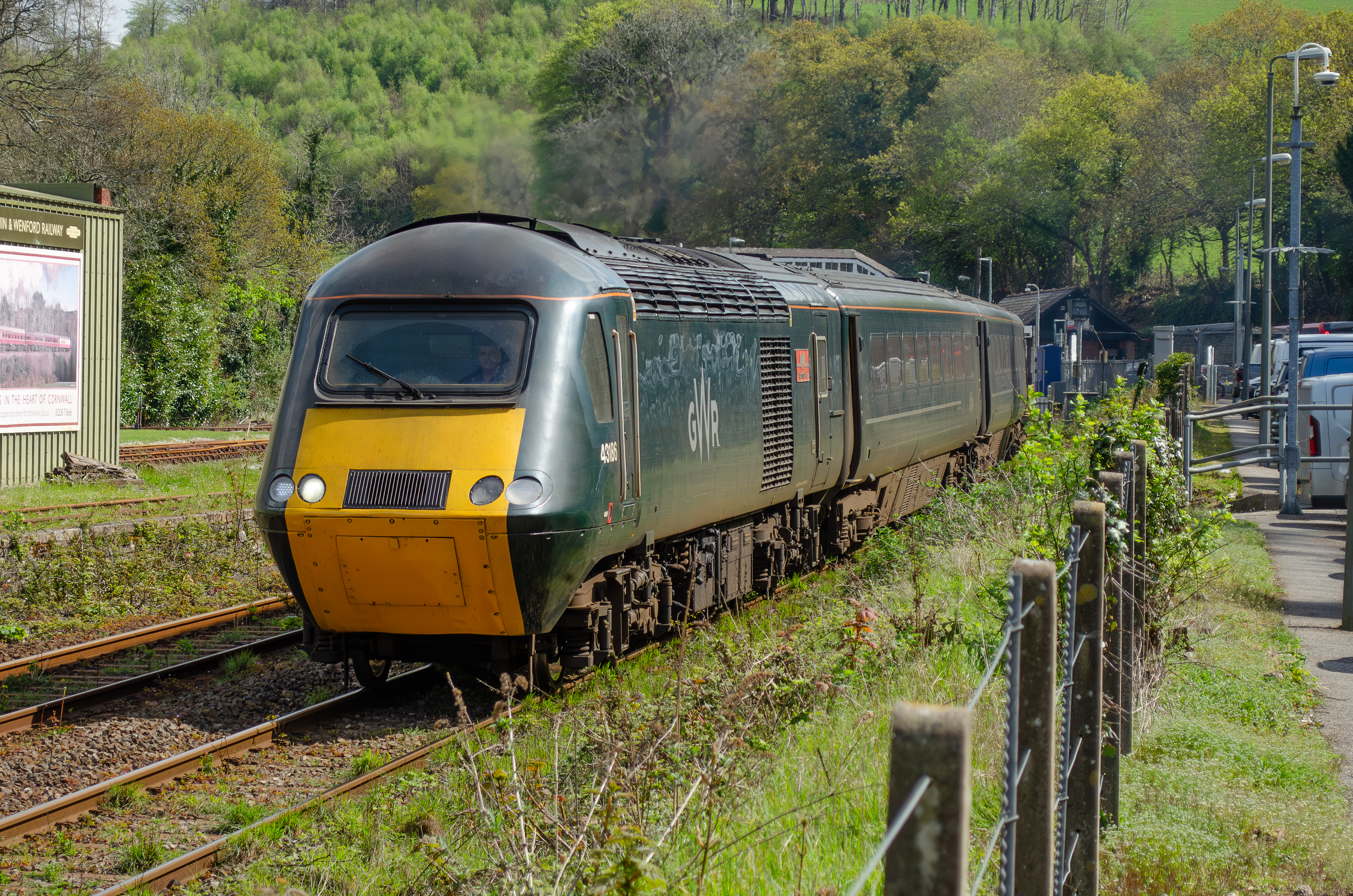 GWR HST No. 43186 leading a GWR Castle set out of Bodmin Parkway